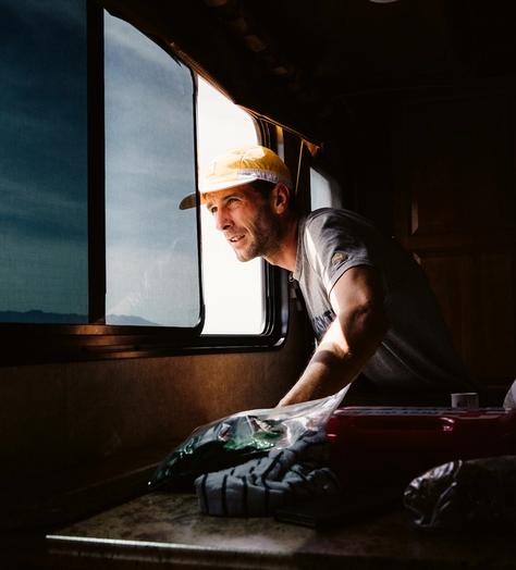 Matt Taylor leaning out a window