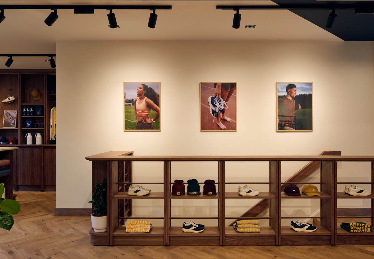 Tracksmith London store, on Chiltern Street, showcasing shelves and aspirational running imagery