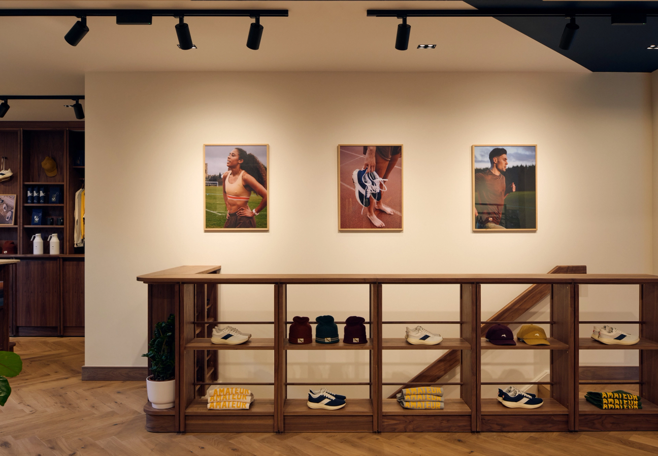 Tracksmith London store, on Chiltern Street, showcasing shelves and aspirational running imagery