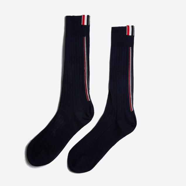 Mid-calf sock by Thom Browne