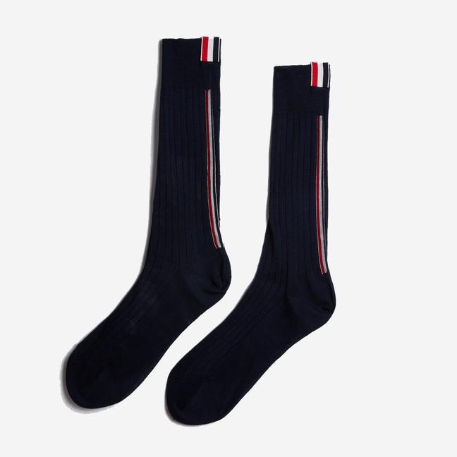 Mid-calf sock by Thom Browne