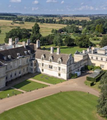 Aerial view of Stapleford Park Hall and its grounds