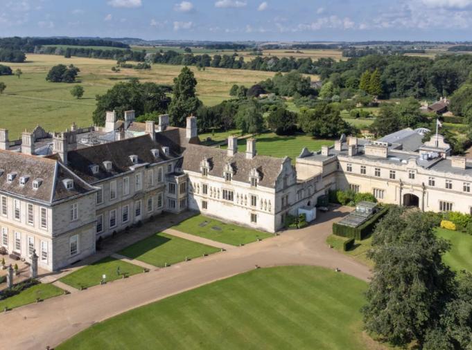 Aerial view of Stapleford Park Hall and its grounds