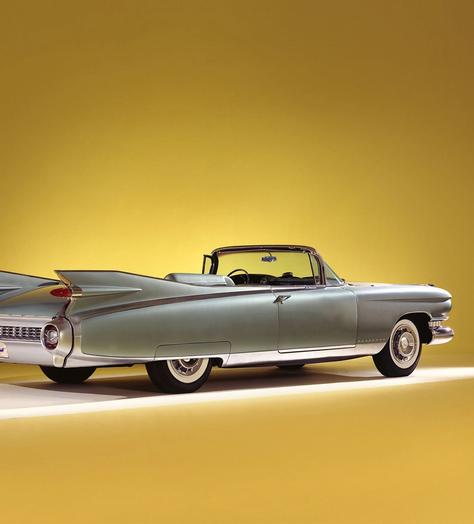 Rear view of a Cadillac Eldorado Biarritz in a yellow setting
