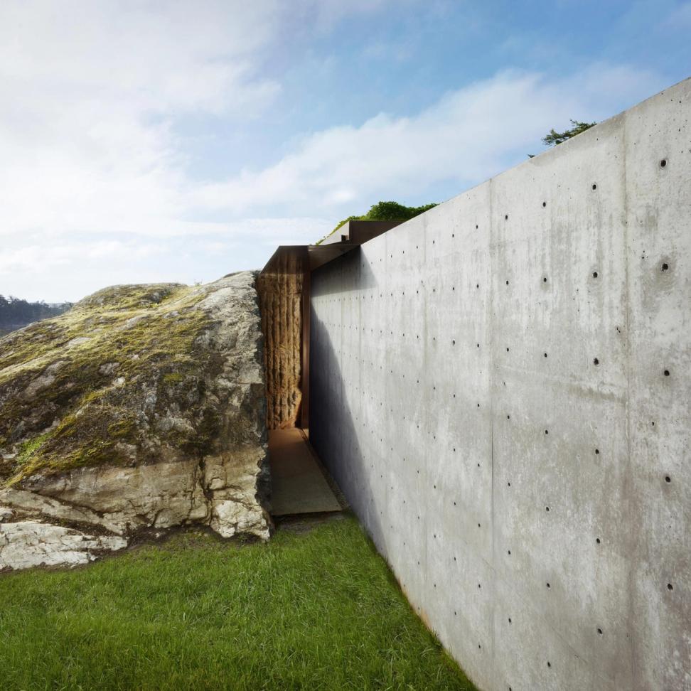 This modern home is carved into the rockface of the Washington ...