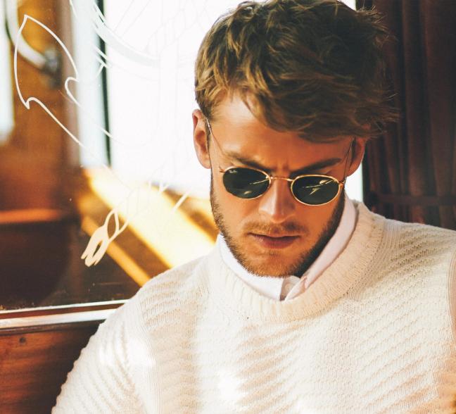 Model wearing rayban round frame sunglasses photographed by Adam Fussell for Gentleman's Journal