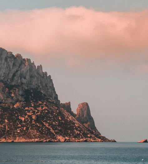 Island off Cala d'Hort beach Ibiza