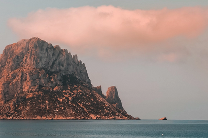 Island off Cala d'Hort beach Ibiza