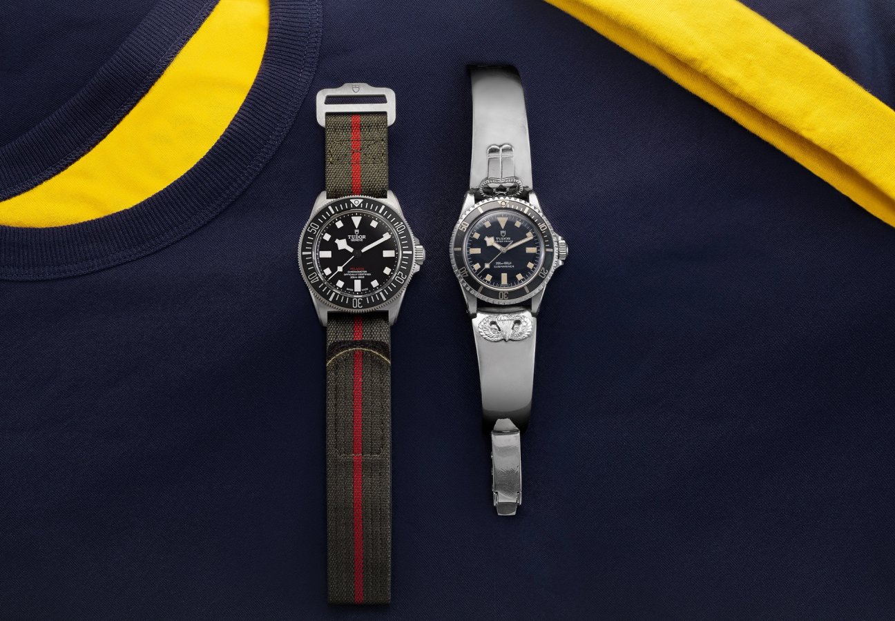 Two Tudor Pelagos FXD watches placed on a navy jumper