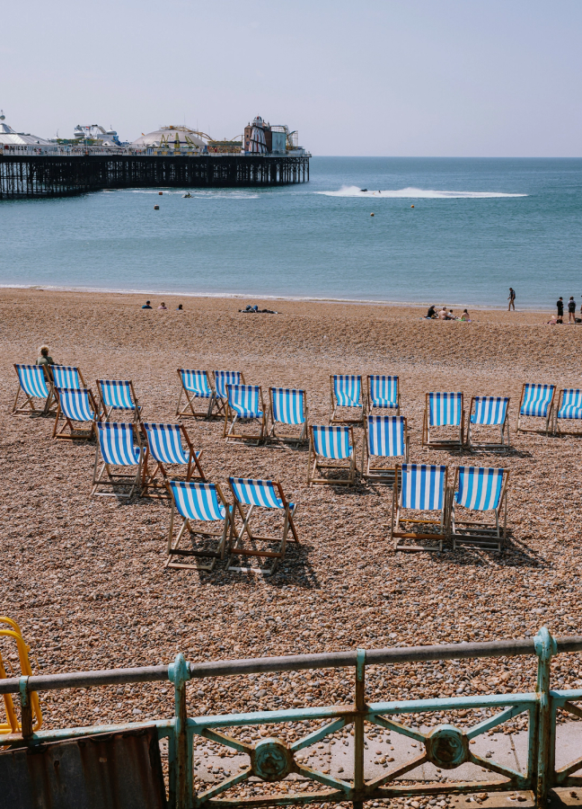 Foldout chairs on a beach