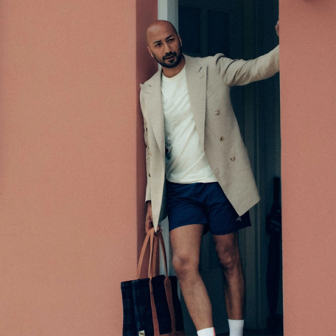 Friend of Tracksmith, wearing a blazer over Tracksmith clothing
