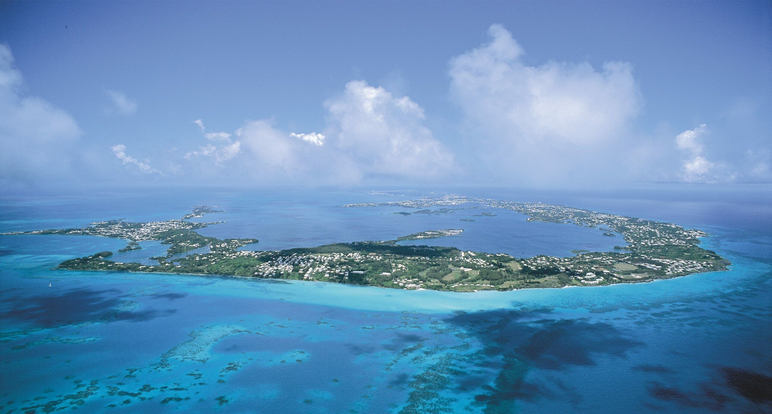 Beautiful Beach In Bermuda With Blue Sea And Clouds High-Res Stock Photo -  Getty Images