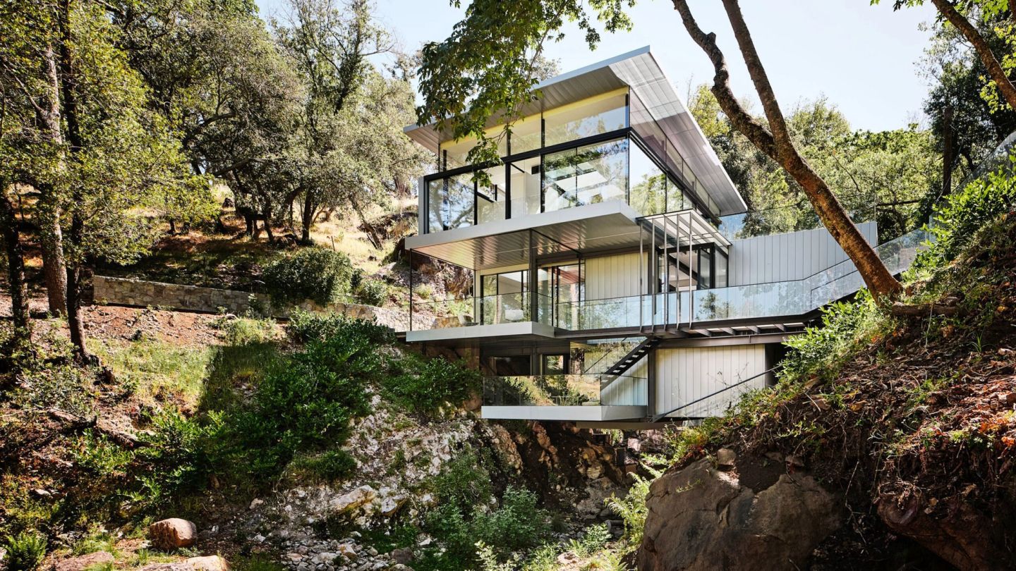 This incredible home hangs between two Californian hills
