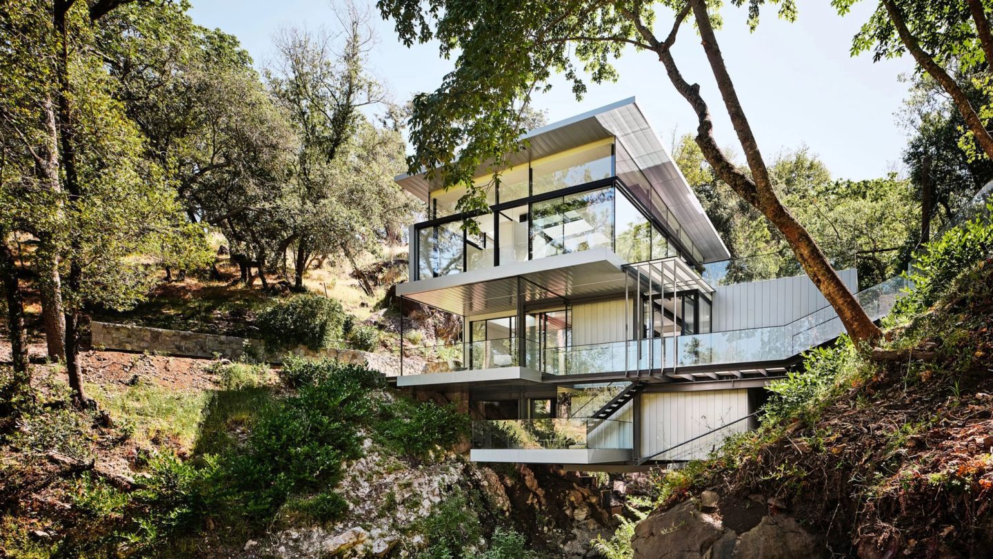 This incredible home hangs between two Californian hills