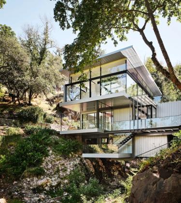 This incredible home hangs between two Californian hills