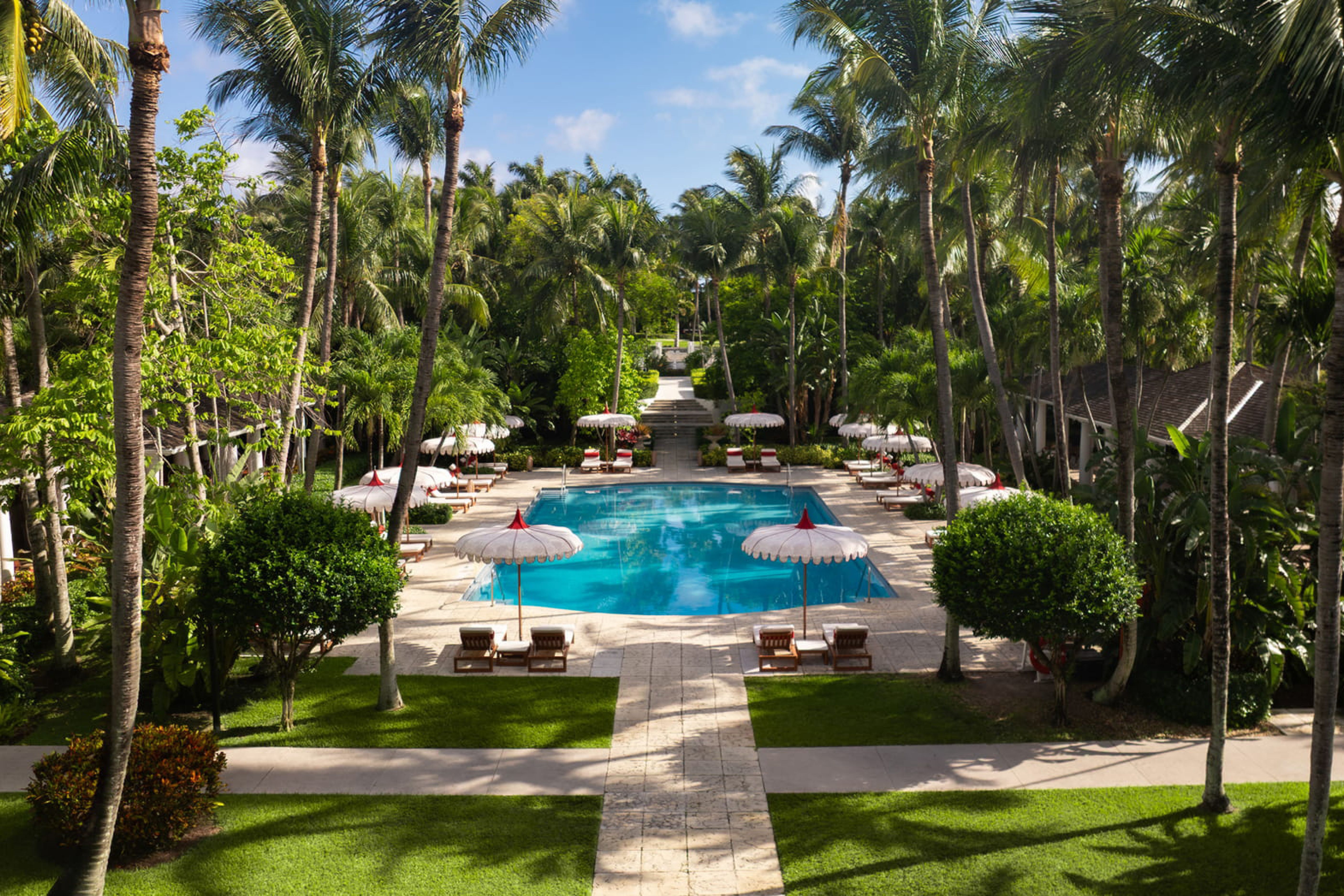 The Versailles Pool surrounded by gardens at The Ocean Club