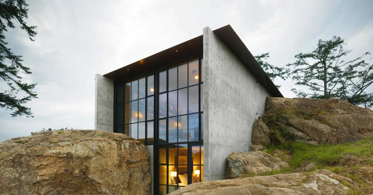 David Rocksavage House This modern home is carved into the rockface of the Washington ...