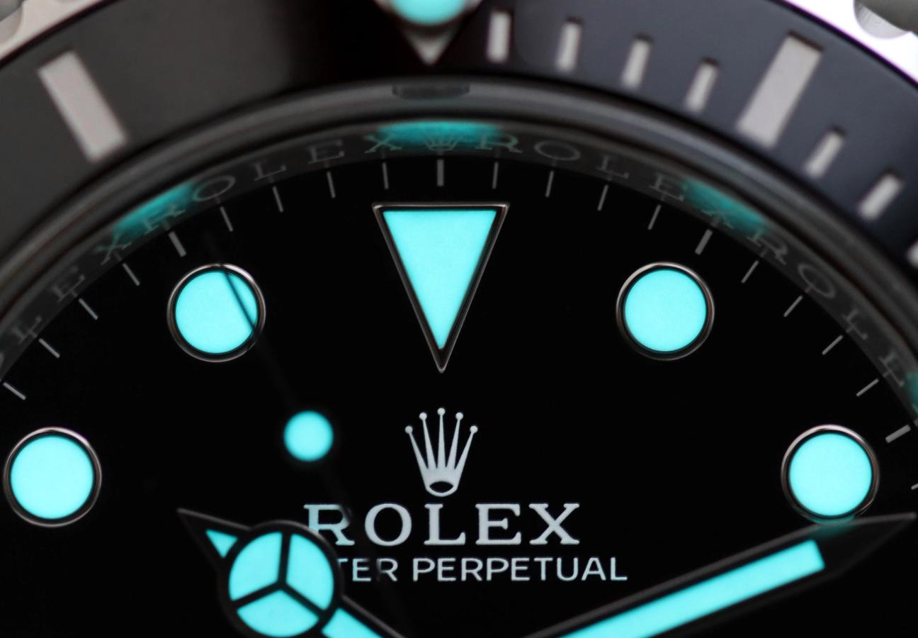 Close up of Rolex watch face with glow in the dark elements