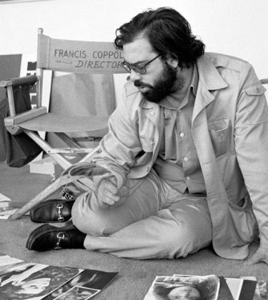 Frances Ford Coppola in his American Zoetrope movie studio in San Francisco, 1970 wearing Gucci loafers