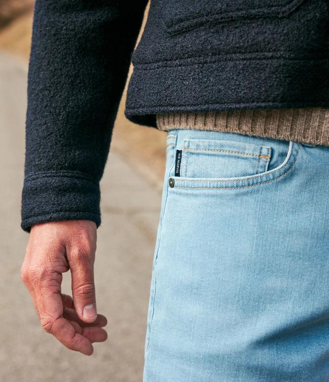 Close up of ultra-light blue Mr Marvis jeans pocket