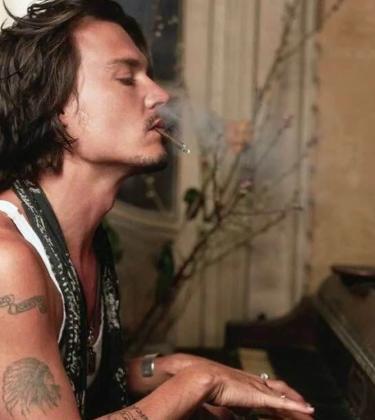 Johnny Depp playing piano