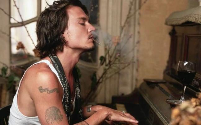 Johnny Depp playing piano