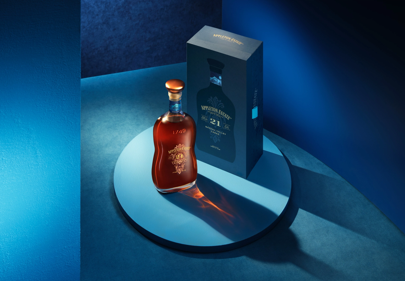 Appleton Estate 21 Nassau Valley Casks rum bottle and box in a blue setting
