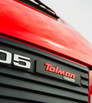 Rear bumper of a red Peugeot 205 GTi Tolman Edition