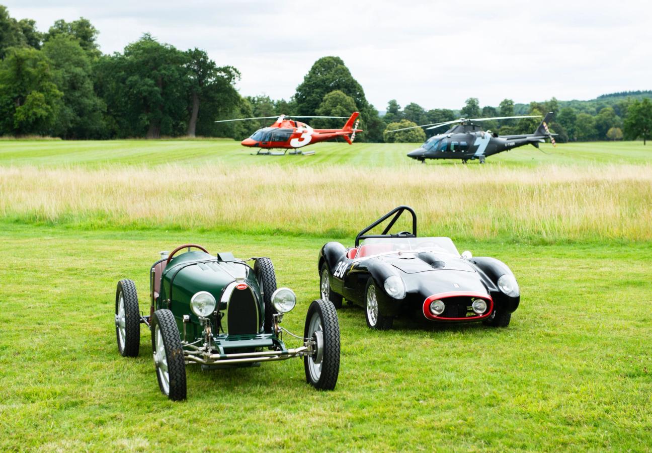 Small classic cars parked on the lawn from Little Car company with Helicopters from Thunder Aviations