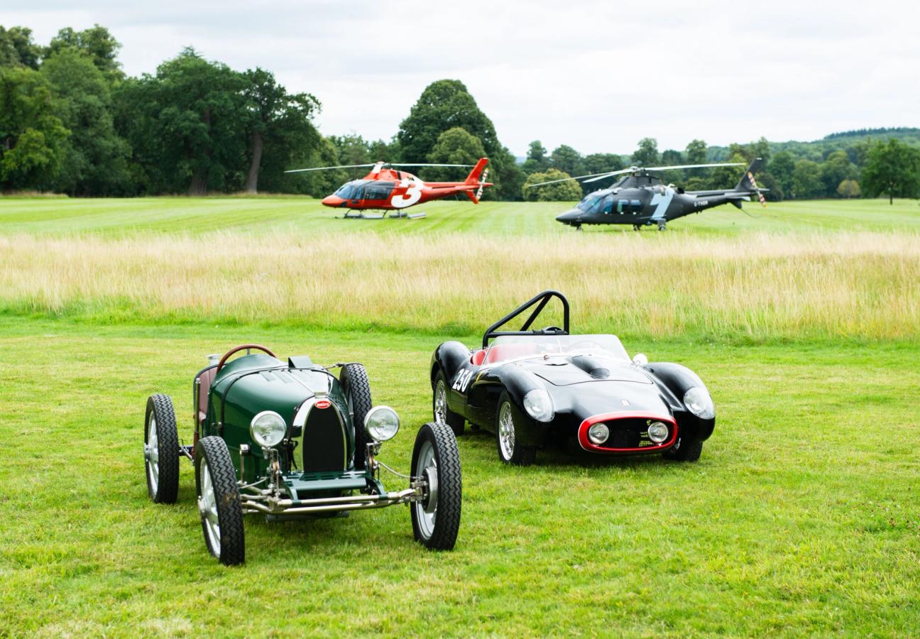 Small classic cars parked on the lawn from Little Car company with Helicopters from Thunder Aviations