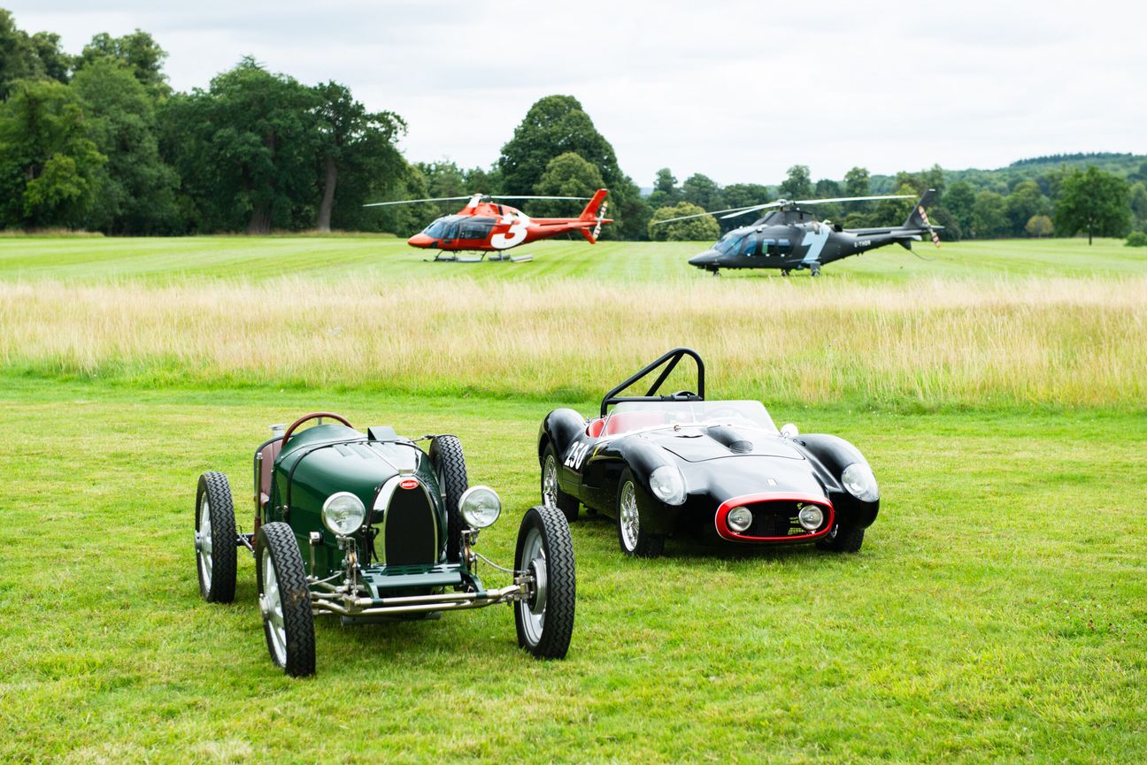 Small classic cars parked on the lawn from Little Car company with Helicopters from Thunder Aviations