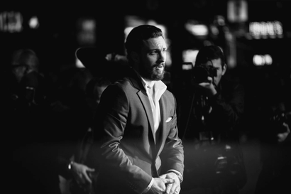 Black and White photo of Aaron Taylor-Johnson on red carpet