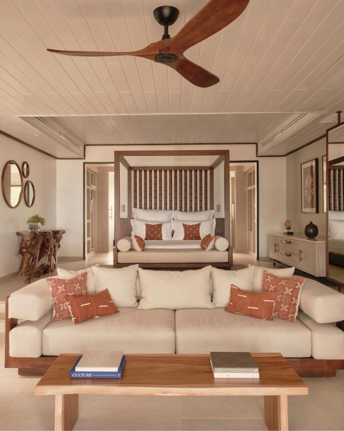 Ocean Suite living area and bedroom at Carlisle Bay Antigua