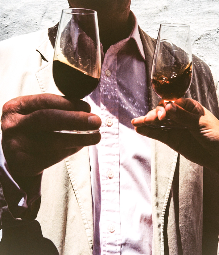 Swirling glasses of port