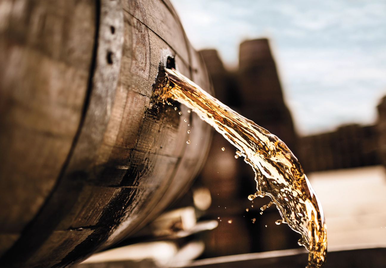 Rum pouring out of a barrel