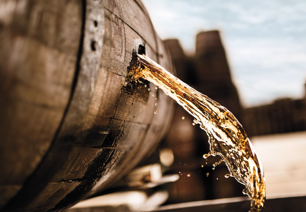 Rum pouring out of a barrel