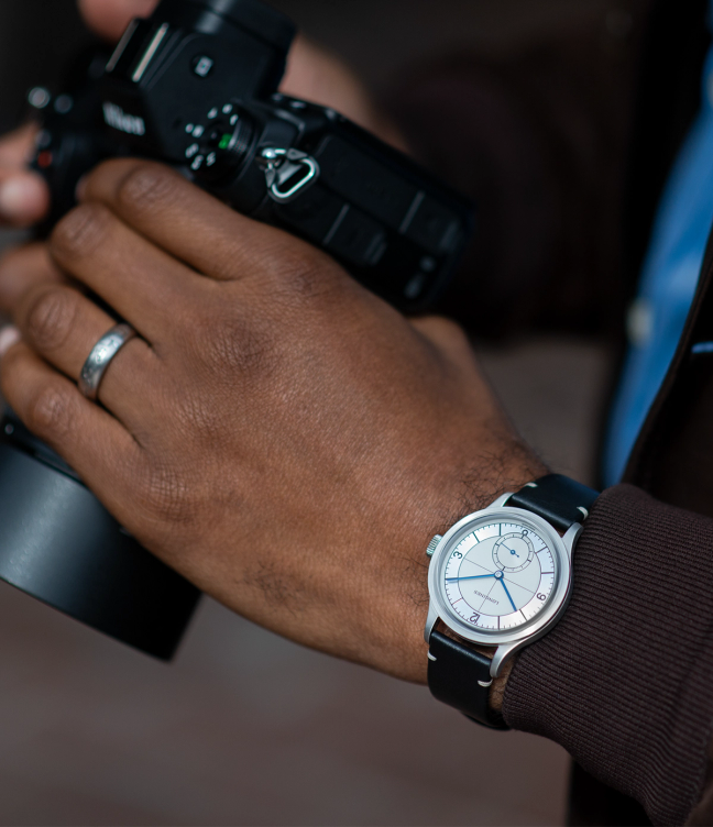 Photographer wearing a Longines L2.828.4.73.0 Men’s Heritage Classic Automatic