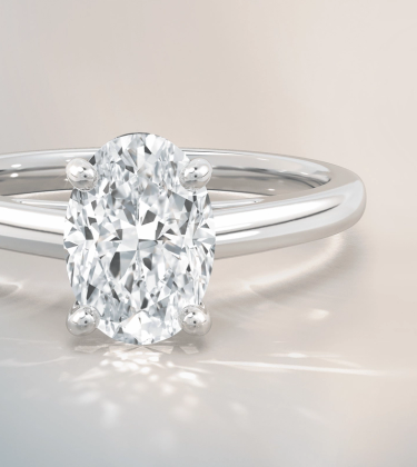 De Beers Jewellers classic oval-shaped diamond ring