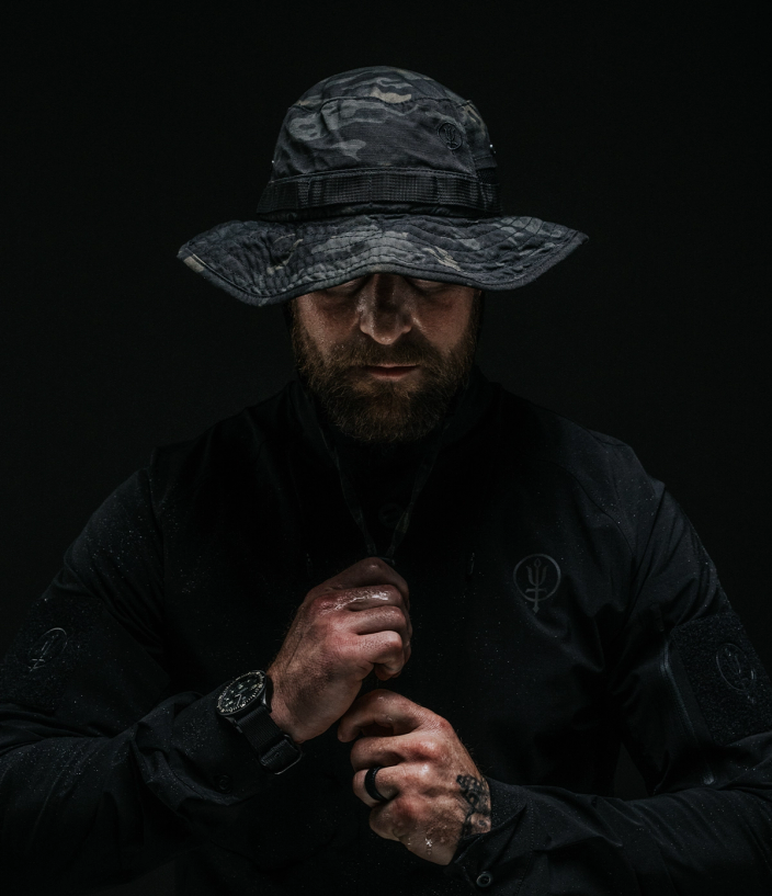 man wearing watchman boonie hat