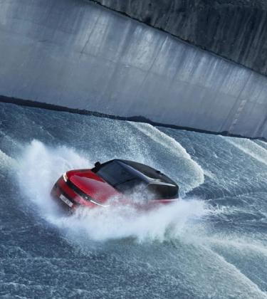 How a No Time To Die stunt driver drove up a dam in a Range Rover Sport