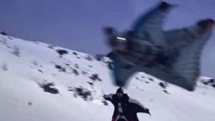 Unbelievable Video – First Ever Wingsuit Flying Above Skiers
