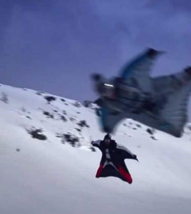 Unbelievable Video – First Ever Wingsuit Flying Above Skiers