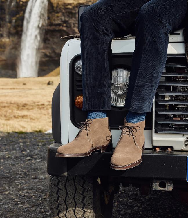Man wearing Crockett & Jones’s Slate Suede chukka boot