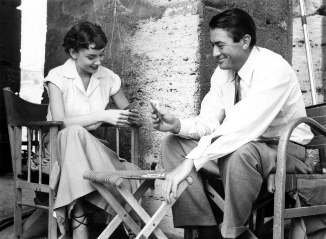 Audrey Hepburn and Gregory Peck playing cards in Roman Holiday 1953