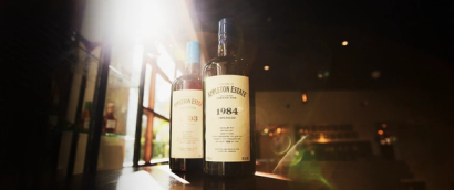 Appleton Estate 1984 and 2003 pot still rum bottles on a table