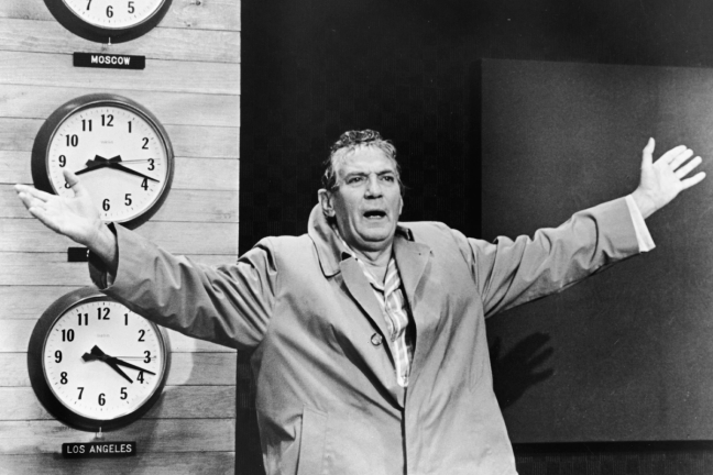 A black and white still of Peter Finch in his best known role, Network
