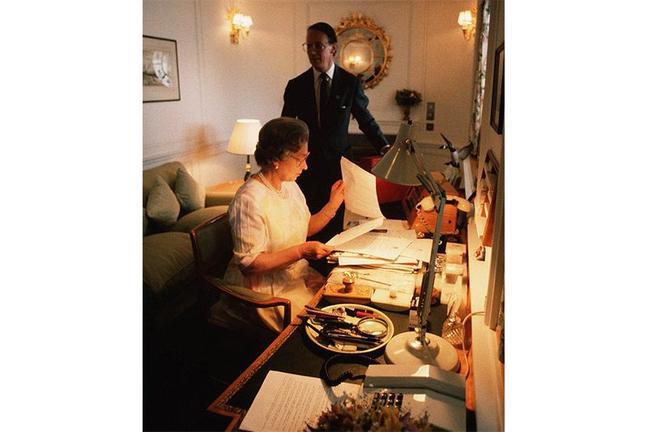 1991 - The Queen at work in her study onboard the the Royal Yacht Britannia (Camera Press)