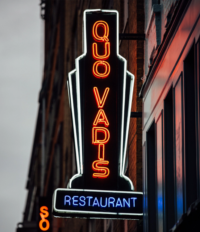 Quo Vadis exterior neon sign