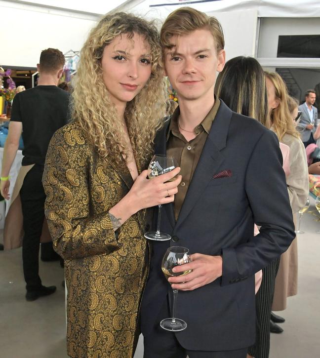 Gzi-Wisdom-and-Thomas-Brodie-Sangster-at-The-Gentlemans-Journal-Summer-Party-at-Masterpiece-London