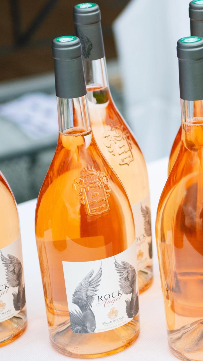 Table full of bottles of Rock Angel Rosé